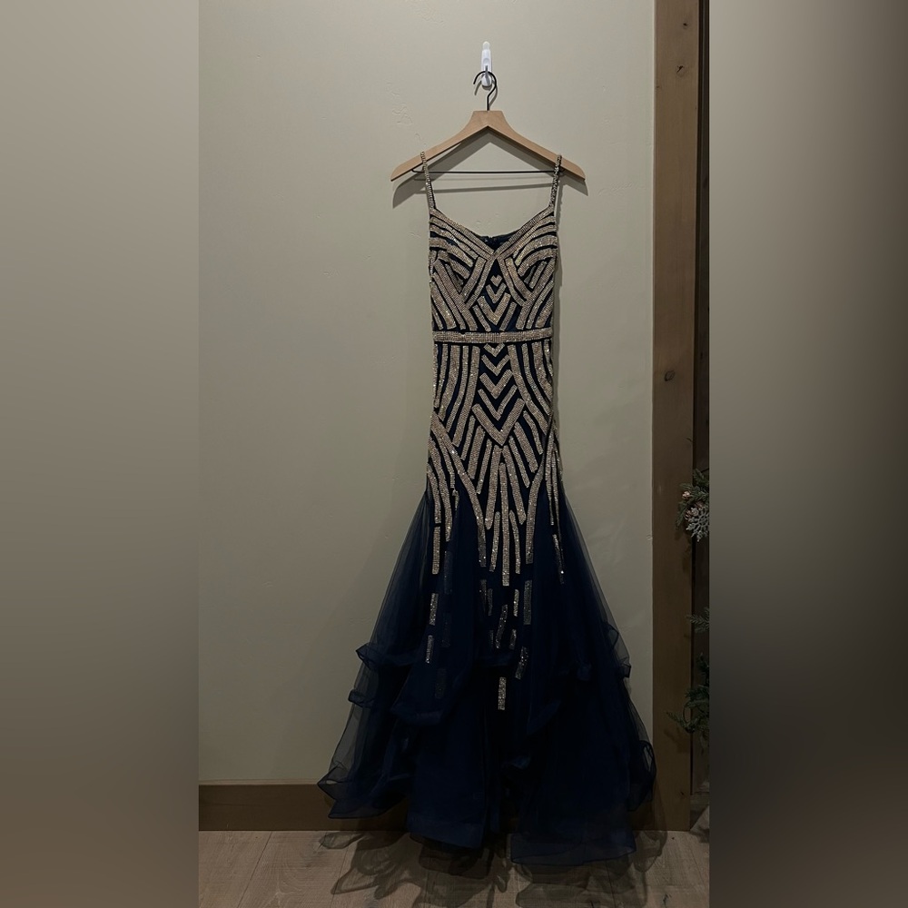 “Let’s” navy fit and flare prom dress size small. Only worn twice.
